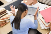 Woman frustrated at desk